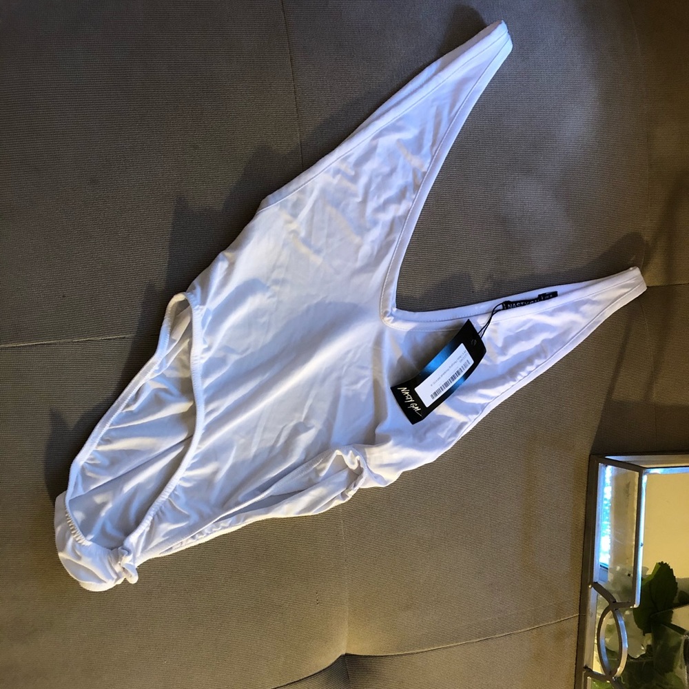 Nastygal size US 4 White deep V neck body. NWT